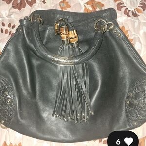 Black Leather Handbag with Tassel Accents